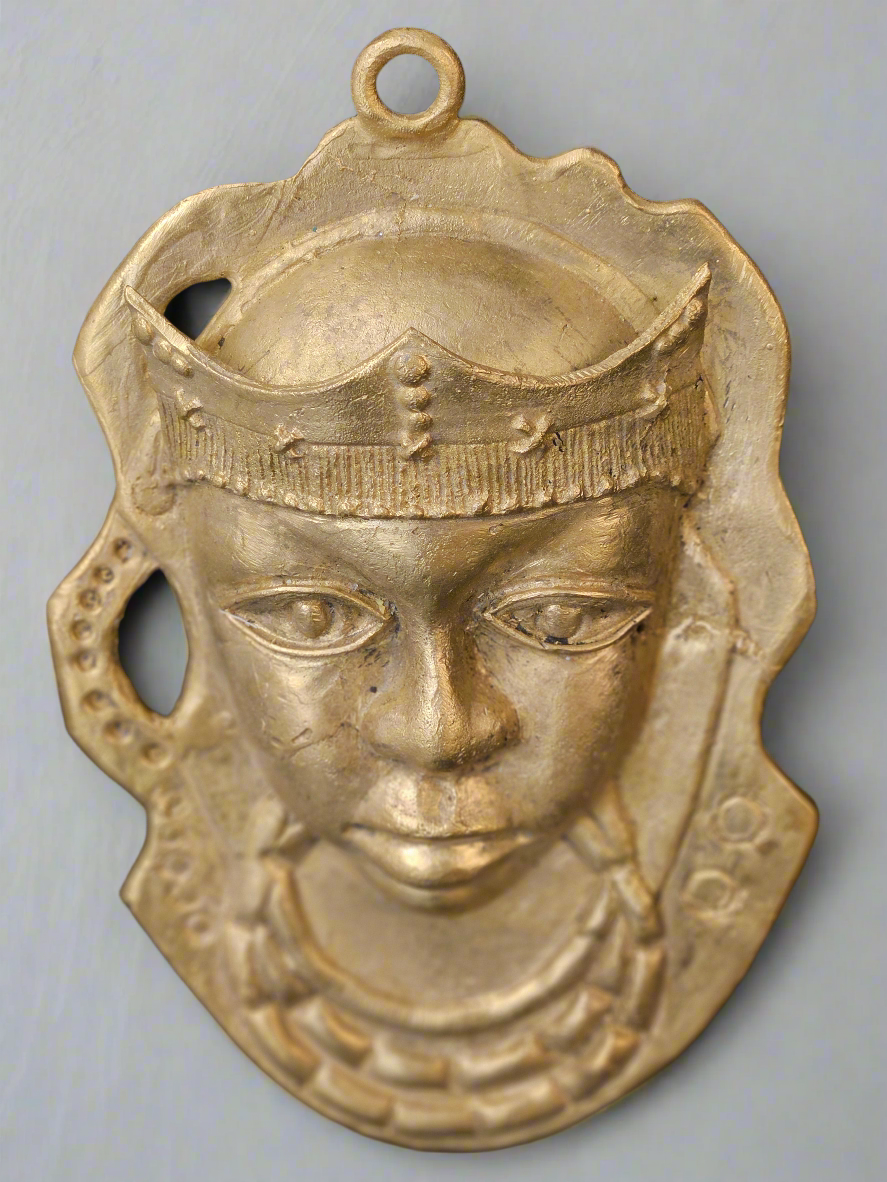 Handcrafted Ashanti brass mask from Ghana measuring 6 x 8.5 inches, featuring royal headpiece and intricate facial details in antique gold finish
